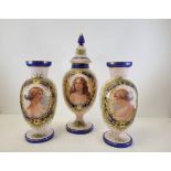 A garniture of late Victorian opaline glass vases including one covered example, each with