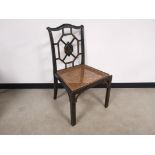 Lacquered oriental single chair, having gilt finish detailing. Wear from general use and age.