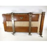 An early 20th Century oak trouser press, The Watts Challenge Company' , 45cm x 73cm