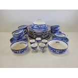 A group of blue and white George Jones Crescent pottery tableware all with a design of confronting