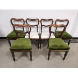 Set of four mahogany side chairs, having green fabric seats raised on turned supports. Together with