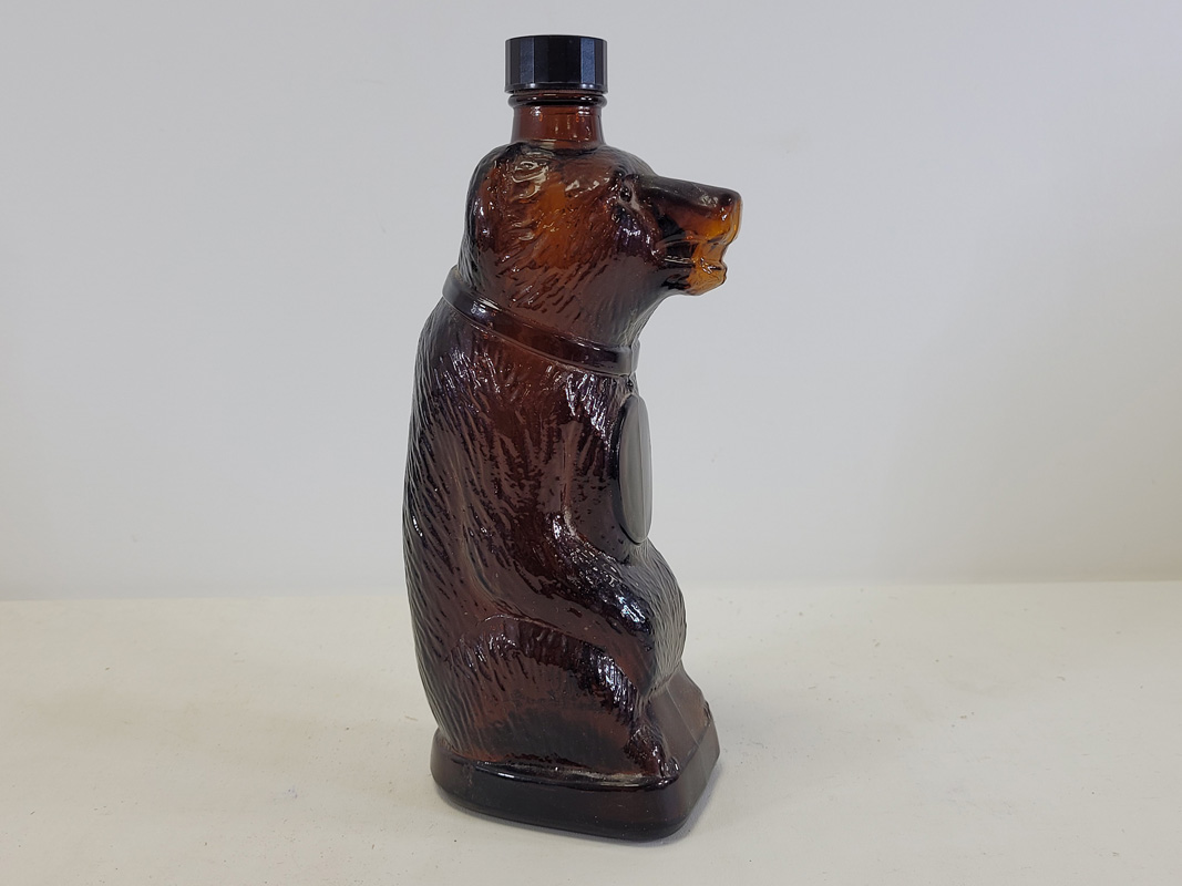 A brown glass bottle in the form of a bear, with impressed numerals 'X729S2UB' to base, height 26cm - Image 2 of 2