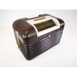 A mid 20th Century Bakelite bush radio, 23cm x 31cm x 20cm