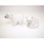 Two Lladro polar bear figures, one sat and one standing. Tallest standing at 10cm (2)