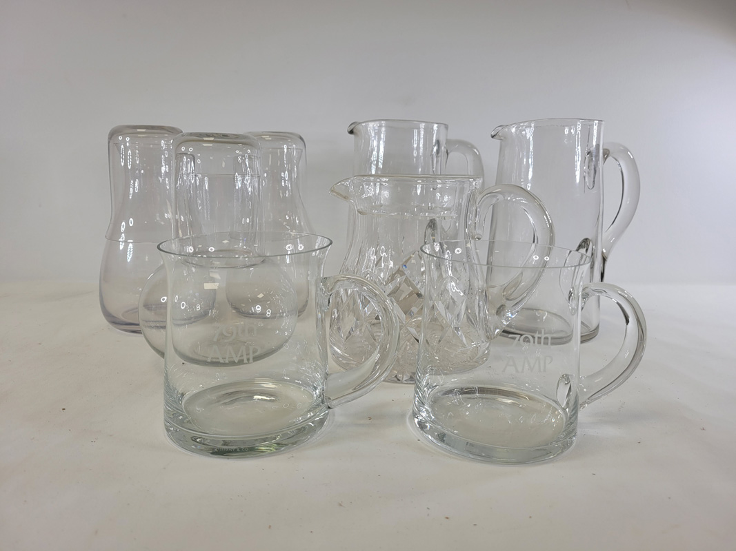 A quantity of assorted 20th Century glassware to include jugs, wine glasses, frosted and moulded