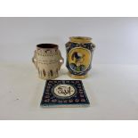 An Italian Maiolica tin glazed pottery alberro style jar pharmaceutical jar with two cartouches of