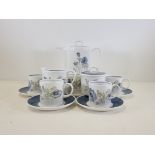 A Susie Cooper for Wedgwood coffee set in the blue poppy 'Glen Mist' design, to include coffee