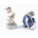 A Royal Copenhagen porcelain figure of a girl feeding a cat, no.421, height 13.5cm, together with