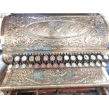 A heavily embossed decorative brass National Cash Register, 226148, Dayton Ohio USA, the single