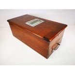 An early 20th Century cash till for Lyndal Fox Yeovil, opening to reveal multiple compartments and