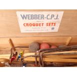 A boxed vintage croquet set by 'Webber C.P.J' , consisting of four mallets, balls, stakes, blue,