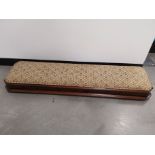 19th Century mahogany rectangular foot rest, Floral patterned upholstery on dark cream ground.