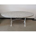 Oval white and grey marble topped table, set on a white painted part cast iron framework base.