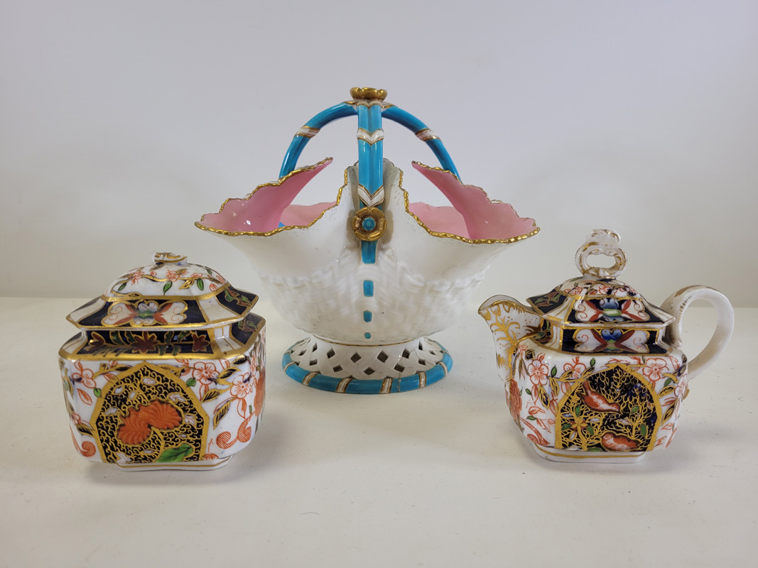 A late 19th or early 20th Century European porcelain basket with turquoise, pink and gilt on a white - Image 3 of 3