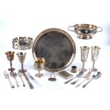 A collection of silver plate, including cutlery, beakers, a double handled tureen, circular tray,