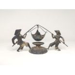 Vietnamese 0900 white metal tea strainer, in the form of two figures supporting a central basket,