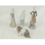 Four Spanish Lladro porcelain figures with a theme of childhood and animals, a girl and duck, girl
