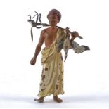 A cold painted Austrian bronze figure of an Arab, supporting dead game across his shoulders, in