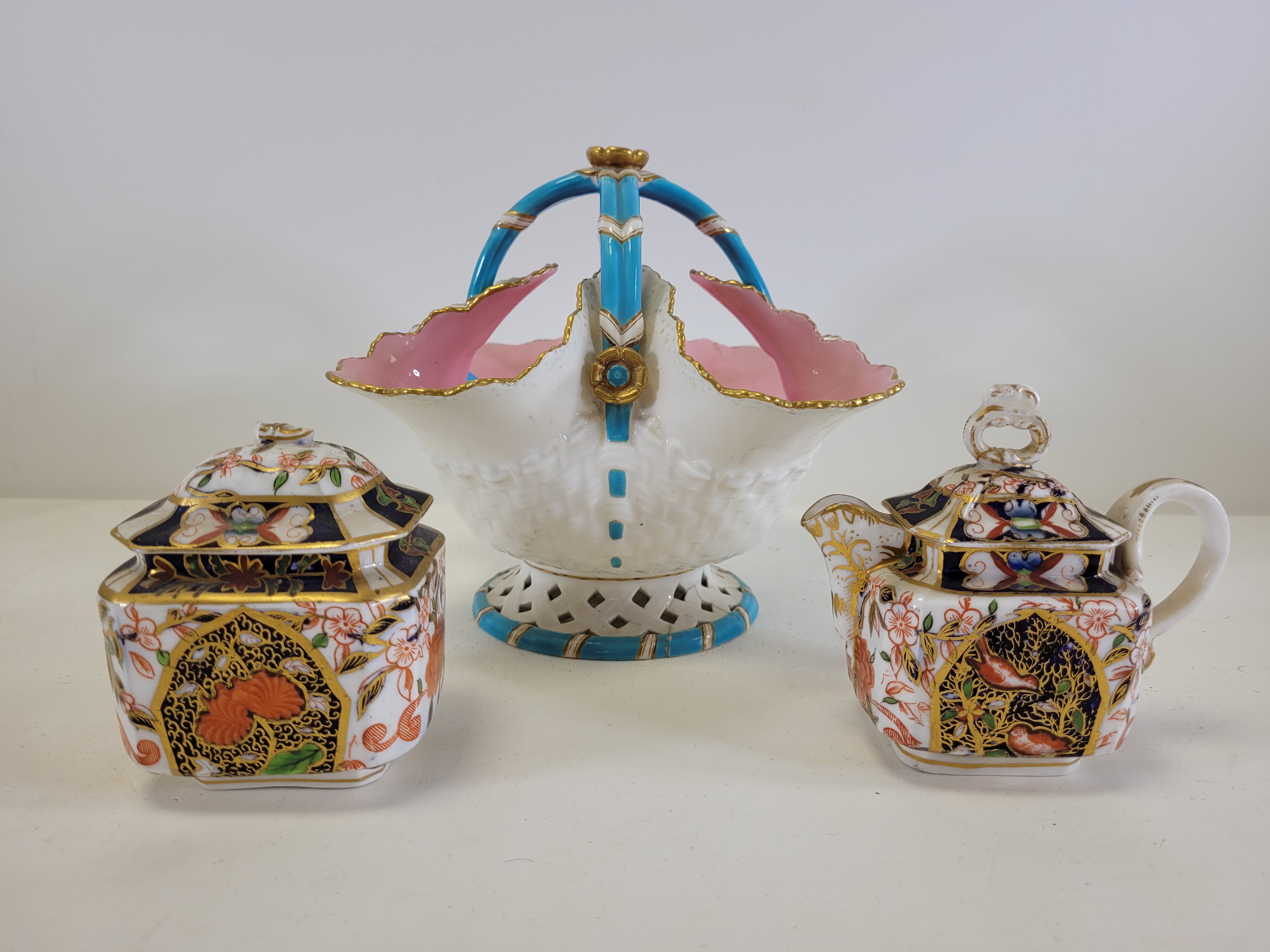 A late 19th or early 20th Century European porcelain basket with turquoise, pink and gilt on a white - Image 2 of 3