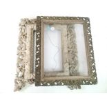 Carved wooden picture frame with scroll decoration, together with a painted frame (a/f) (2)