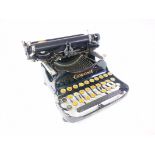 Corona portable folding typewriter, together with carry case. 27cm x 26cm x 15cm when assembled.
