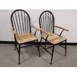 Pair of metal framed Scandinavian style arm chairs, With wooden panels to the arm rests and seat,