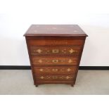 Foliate brass marquetry cabinet, four single drawers with inlay decoration and flush brass