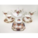 A quantity of Royal Albert tea wares in the 'Old Country Roses' pattern, to include two teapots in