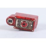 A Coronet Midget Miniature Camera, red, shutter working, body G, viewfinder clear, with loaded film