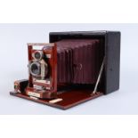 A Kodak Rochester Optical Pony Premo No 7 Folding Camera, circa 1910, half plate, maroon bellows,