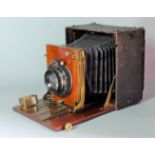 A Thornton-Pickard 'Folding Ruby' Half-Plate No. 2 Hand and Stand Plate Camera, black leather-