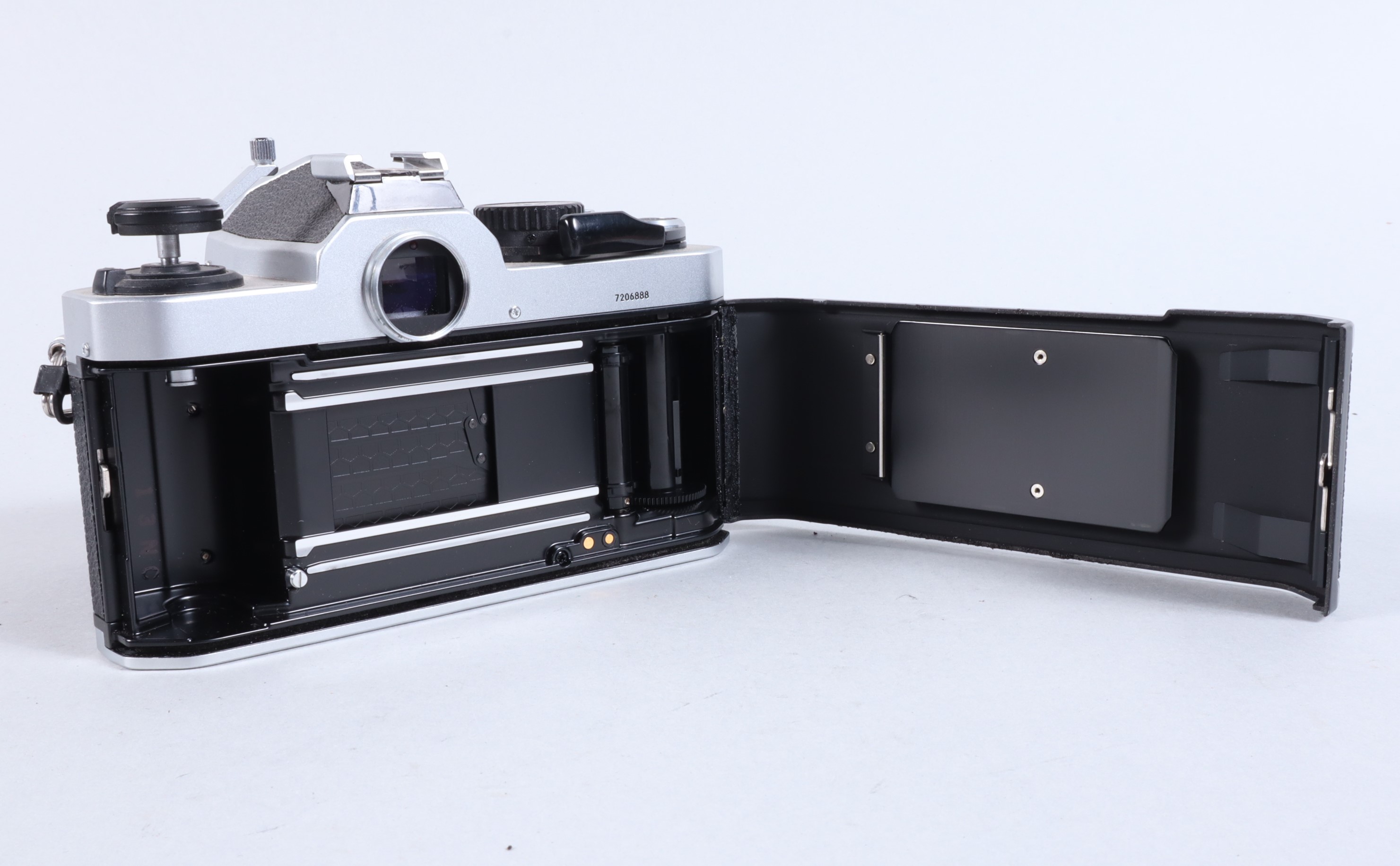 A Nikon FM2 SLR Camera, chrome, serial no 7206888, shutter working, meter responsive, self timer - Image 6 of 6
