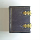 A 19th Century 'G R & Co' Gilt Morocco Octavo Carte-de-Visite Album, with decorative brass clasp, 24