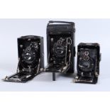 Three German Folding-Bed Cameras, comprising an ICA Nixe 555, 8 x 10.5cm format, with viewing