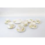 A Royal Albert part teaset, Friendship Series Primrose Pattern, comprising four cups, five