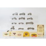 A collection of Danbury Mint pewter car models, with certificates (12)