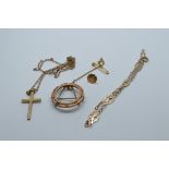 A small collection of 9ct gold, including bracelet, cross and chain, sovereign mount, and pin, 7.6g