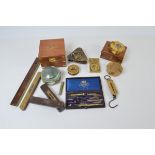 A collection of brass and mahogany spirit levels and measures, together with a leather cased drawing