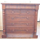 A Victorian walnut veneered Scottish chest of drawers, with secret frieze drawer, two short over