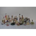 A large collection of 20th Century Asian figurines, in porcelain, stoneware and resin, modelled as