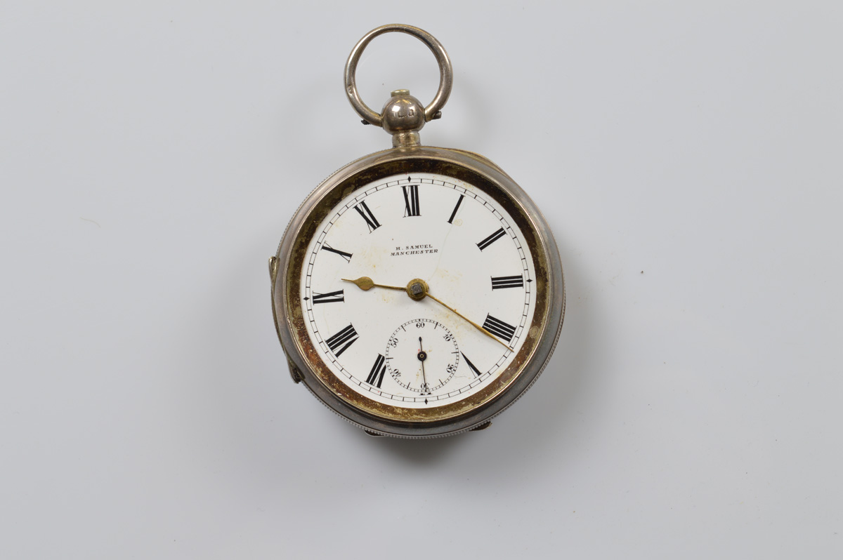 A George V silver open faced fob watch by H Samuel, white enamel dial, roman numerals, seconds