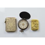An Edwardian electro plated vesta case, a Japanese Meiji period brass vesta case and an Edwardian
