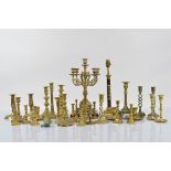 A brass ornate four branch candelabra, on a hardwood base together with a quantity of brass and