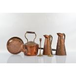 A quantity of copperware, including two tapered jugs with strap handles, 35cm high and 31cm high