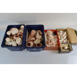 A large quantity of assorted porcelain doll heads and limbs, (5boxes)