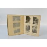 An early 20th century German family photograph album, shows various family photos dated from 1909