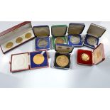 A collection of commemorative cased medallions, of local Midland interest, including a silver