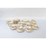 A Staffordshire Salisbury china Bradleys teaset, comprising nine cups, twelve saucers, twelve side