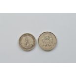 A George VI South African 1952 5 shilling, together with a Jamaican 1979 5 dollar Norman W Manley