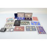 A collection of cased commemorative British Commonwealth and World Coin sets, including New